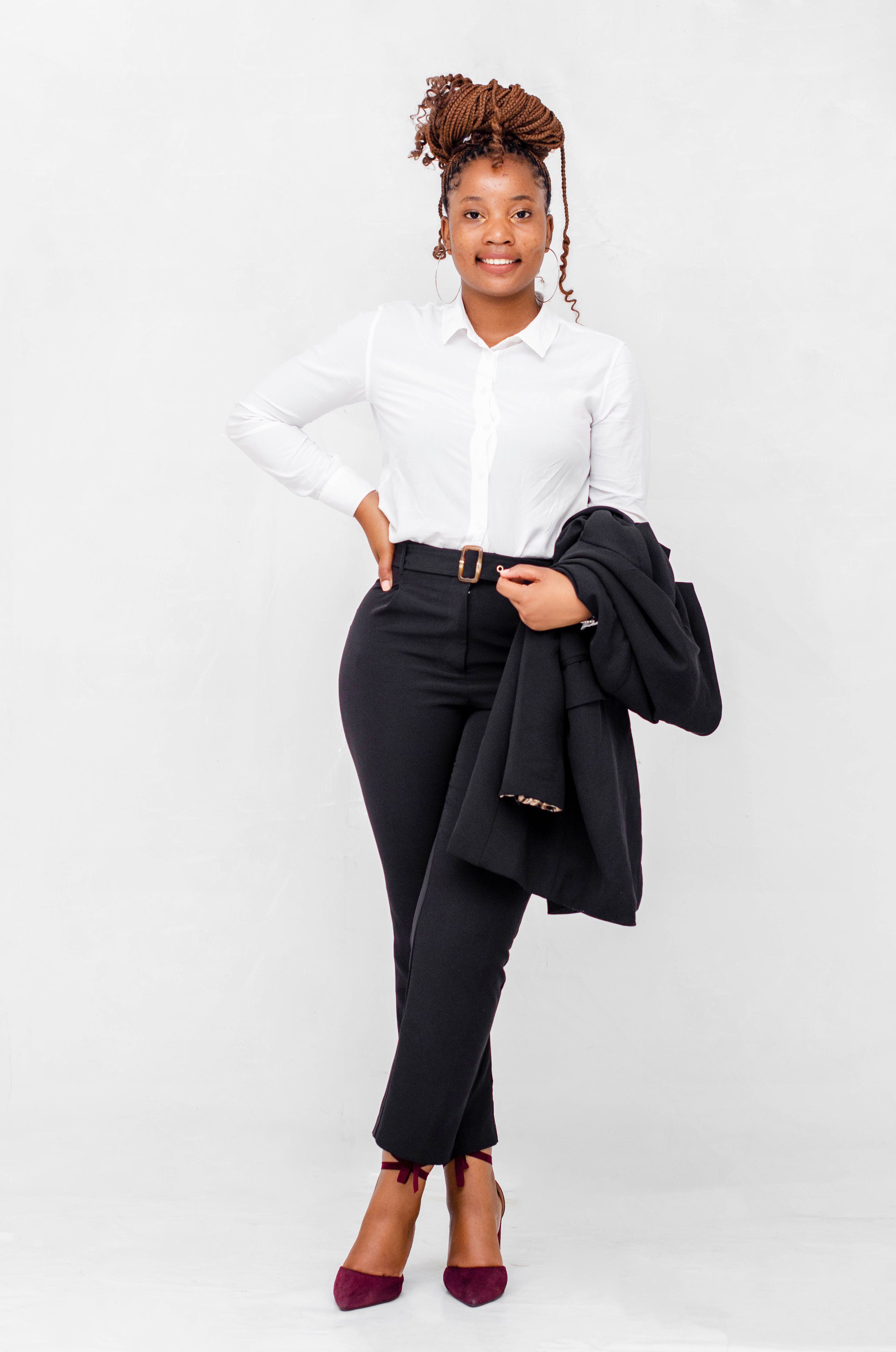 Professional wearing a blouse and trousers